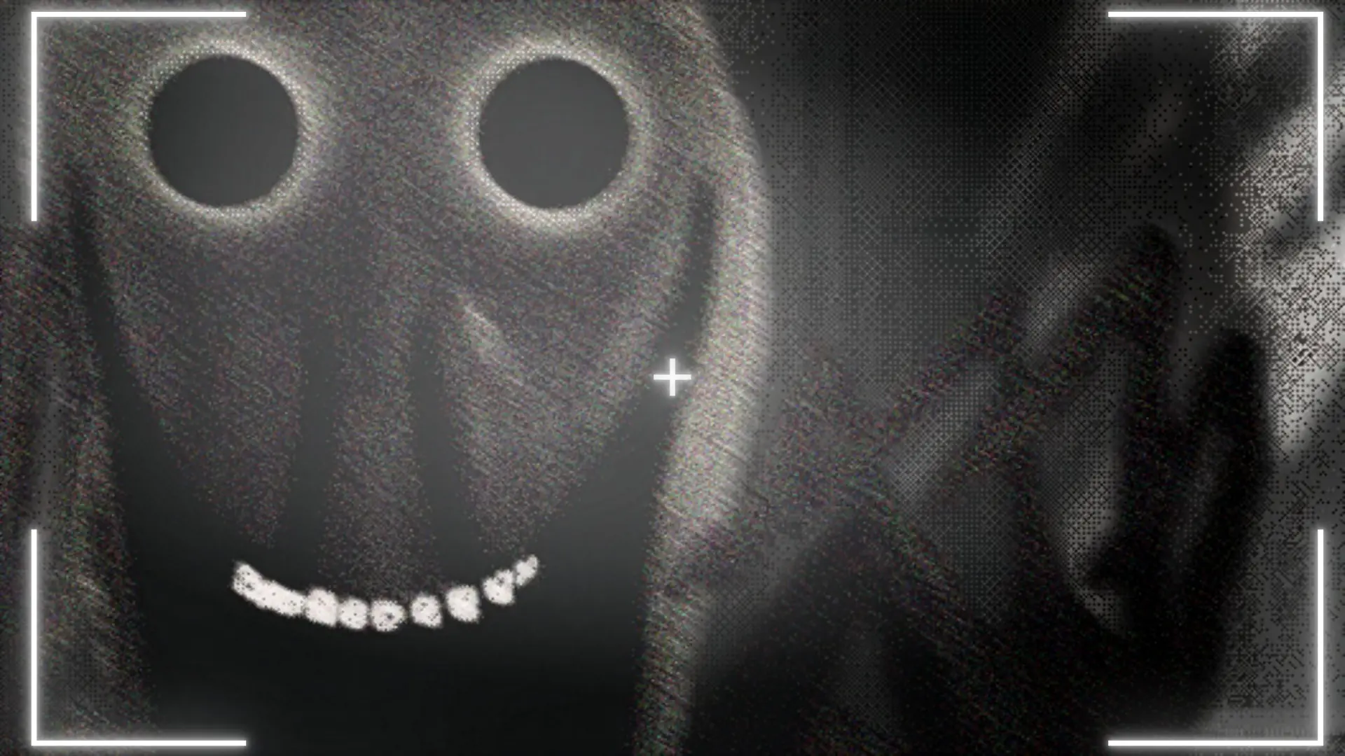 A smiling entity captured at close range through the in-game camera